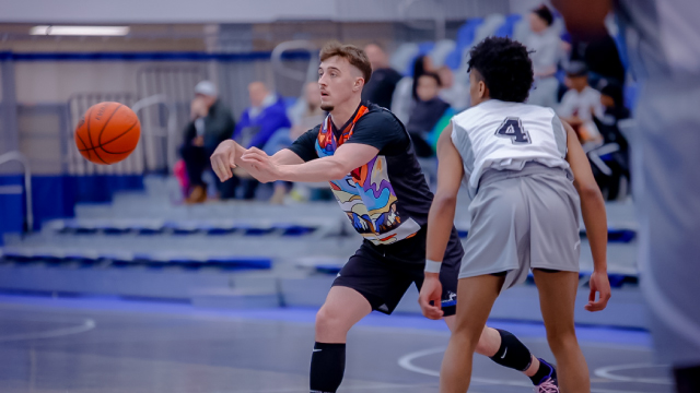 Men's Basketball Huskies shine offensively in playoff win over Wolves