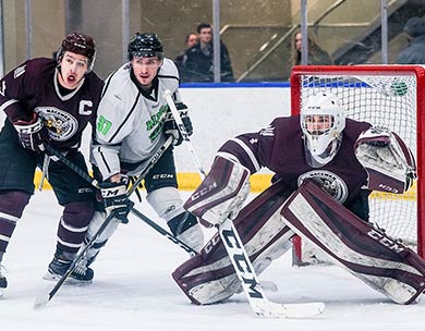 MacEwan Griffins&rsquo; Brett Njaa battles for the puck against Red Deer College in Game 1 on Friday. The Griffins won 4-1 then and 4-2 on Saturday night to sweep the Kings and advance back to the ACAC final that they won a year ago (Matthew Jacula photo)
