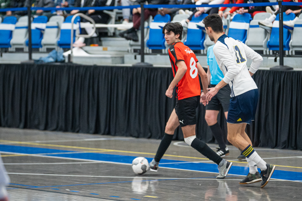 Trojans advance to semis after wild finish against Ooks