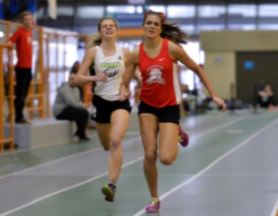 SAIT's Ricki Christopher holds off Lethbridge College runner Sophia Nowicki to win the women's 1,000m race Photo credit: Miranda Haughian/SAIT Trojans